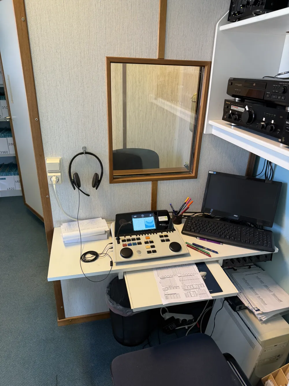 Audiometer and headset on the examiner's desk